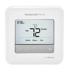 Honeywell T4 Pro Programmable Thermostat mounted on wall, showing digital display and control buttons for temperature adjustment.