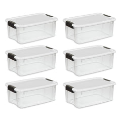 Six Sterilite 18 Quart clear plastic storage bins with white lids and black latches, ideal for organizing and storage.