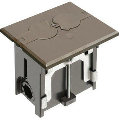 Arlington FLBAF101BR adjustable floor box kit with outlet and flip plate, installed in brown 1-gang floor for electrical wiring.