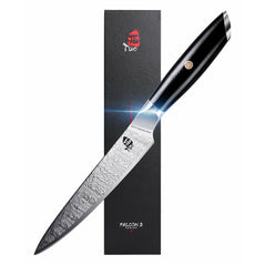 TUO Falcon S 5-inch paring knife with sharp stainless steel blade for precise kitchen prep and peeling tasks.