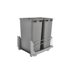 Rev-A-Shelf double 50-quart pull-out waste containers with soft-close mechanism in a kitchen cabinet.
